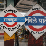 Where is the nearest train station to Juhu Beach?